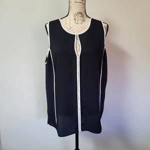 White House Black Market B/W sleeves blouse in XL.